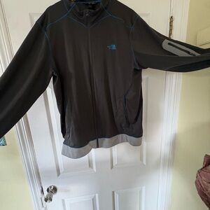 The North Face Men's Performance Jacket in Gray with Blue Accents